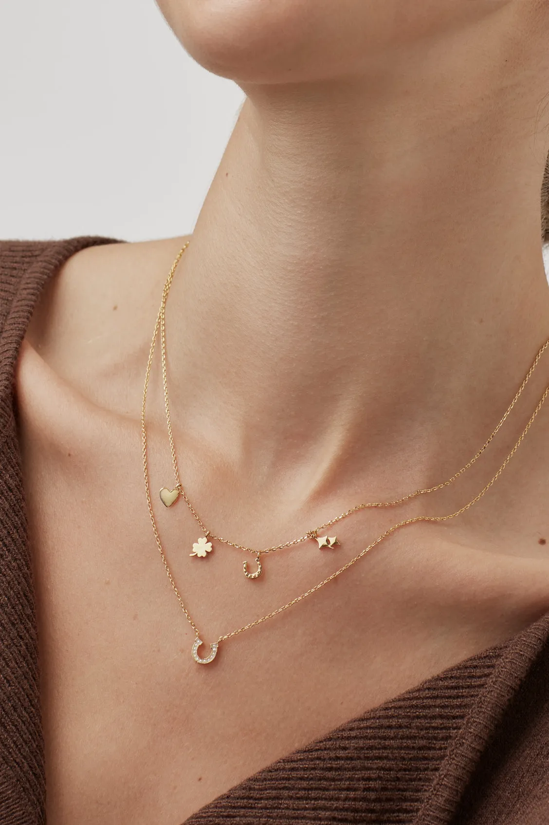 Love and Luck Charm Necklace sold by Estella Bartlett product image thumbnail 2