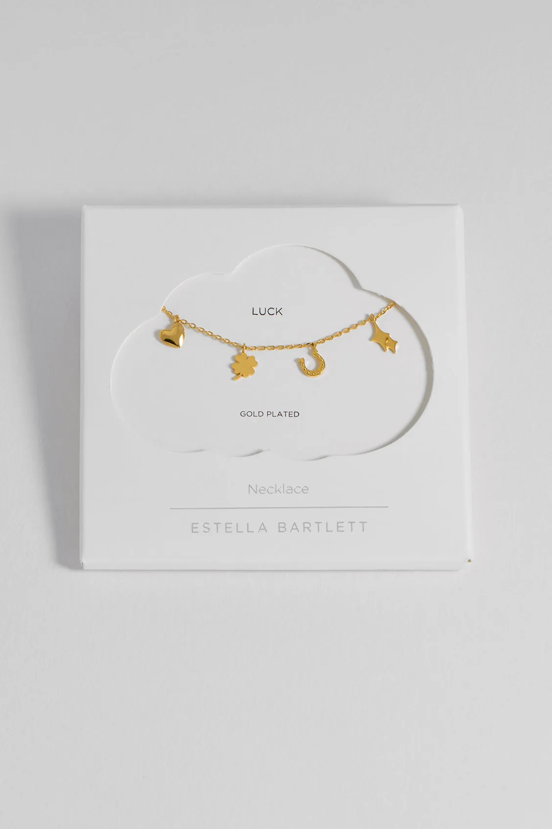 Love and Luck Charm Necklace sold by Estella Bartlett