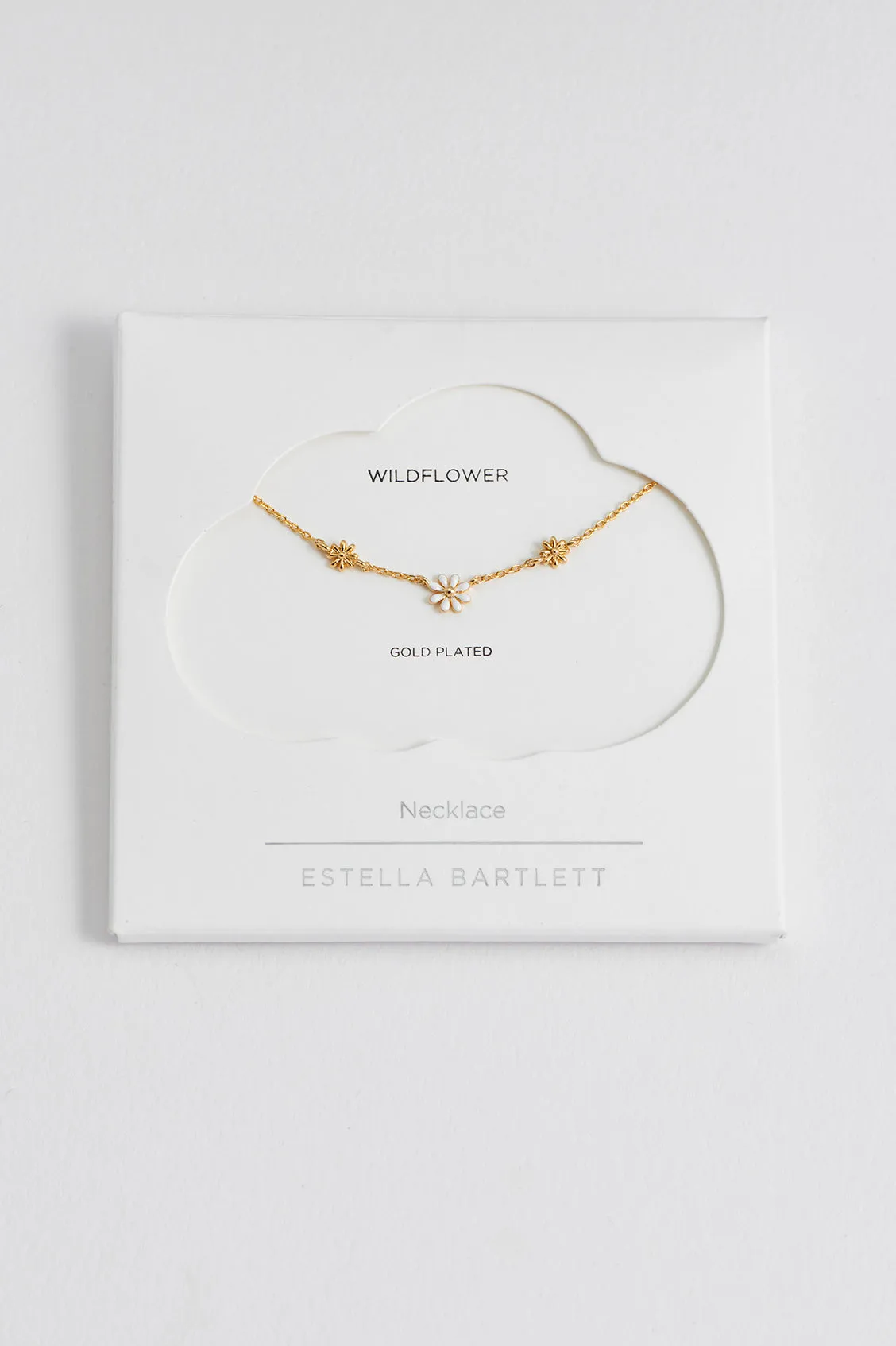 Triple Flower White Enamel Necklace sold by Estella Bartlett