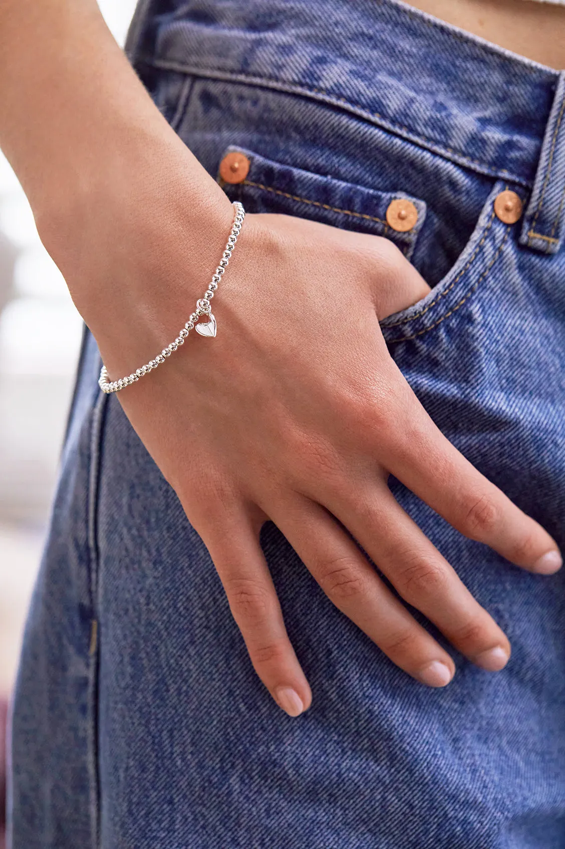 Sienna Beaded Folded Heart Charm Bracelet sold by Estella Bartlett product image thumbnail 4