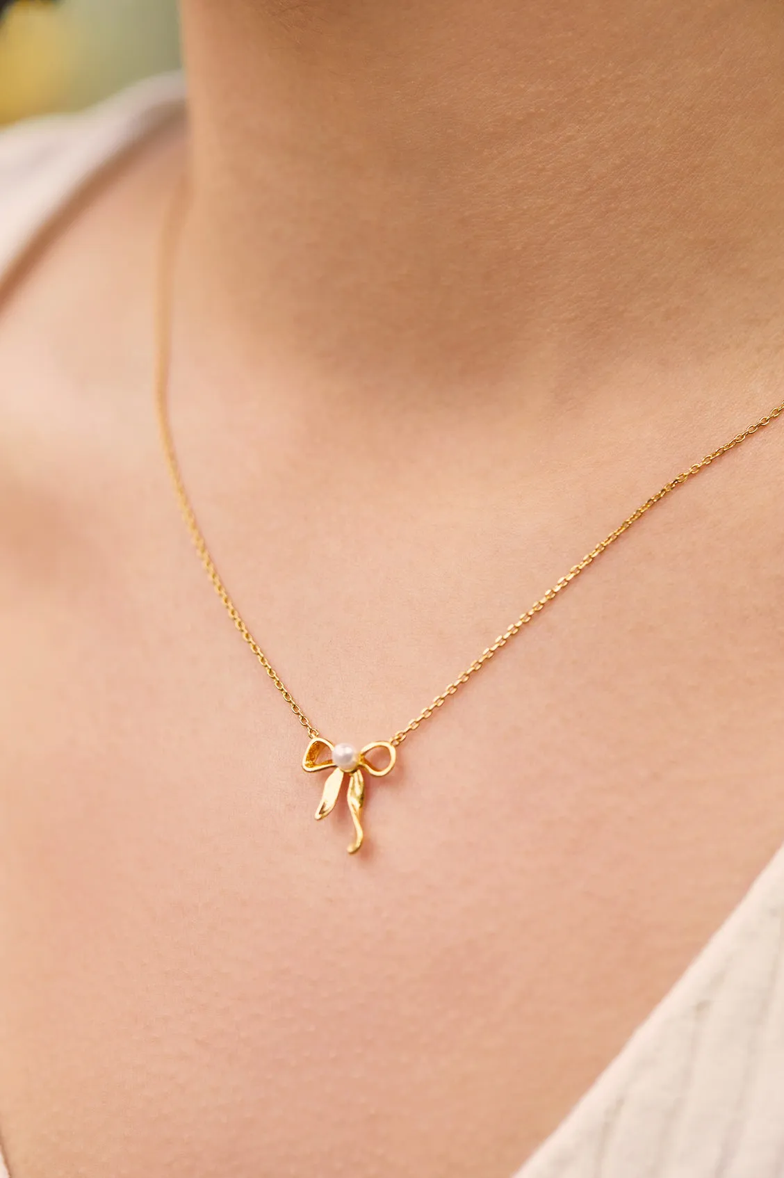 Pearl Bow Necklace sold by Estella Bartlett product image thumbnail 5