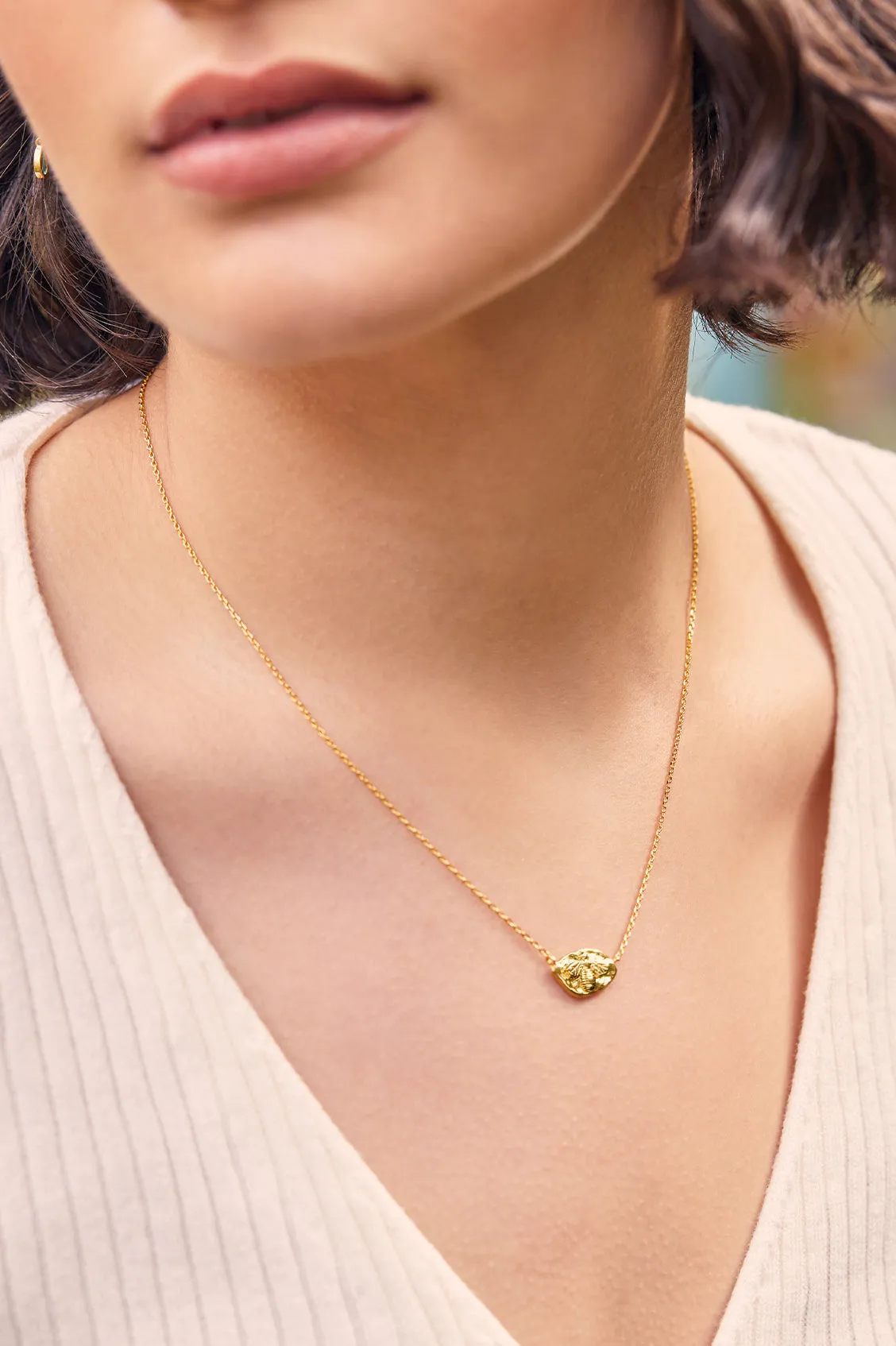 Hammered Coin Bee Pendant Necklace sold by Estella Bartlett product image thumbnail 4