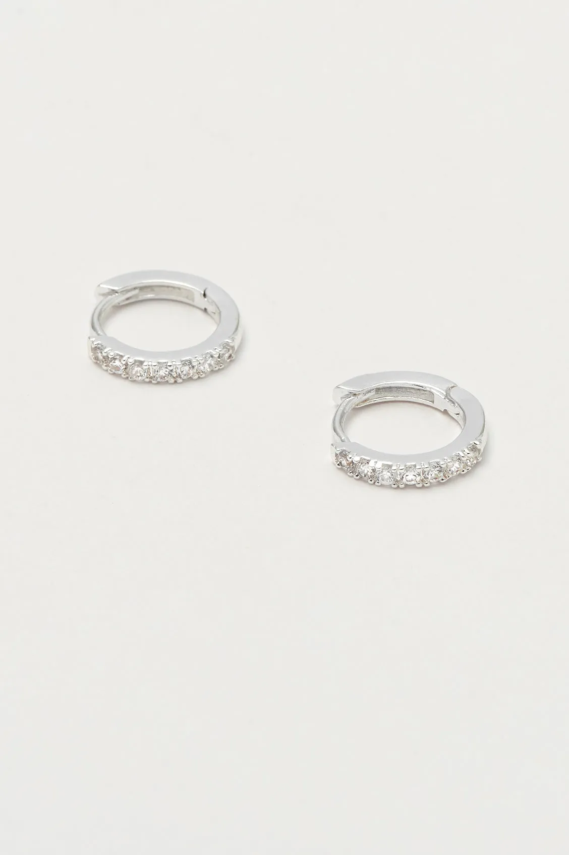 Hoop Earrings with White CZ sold by Estella Bartlett
