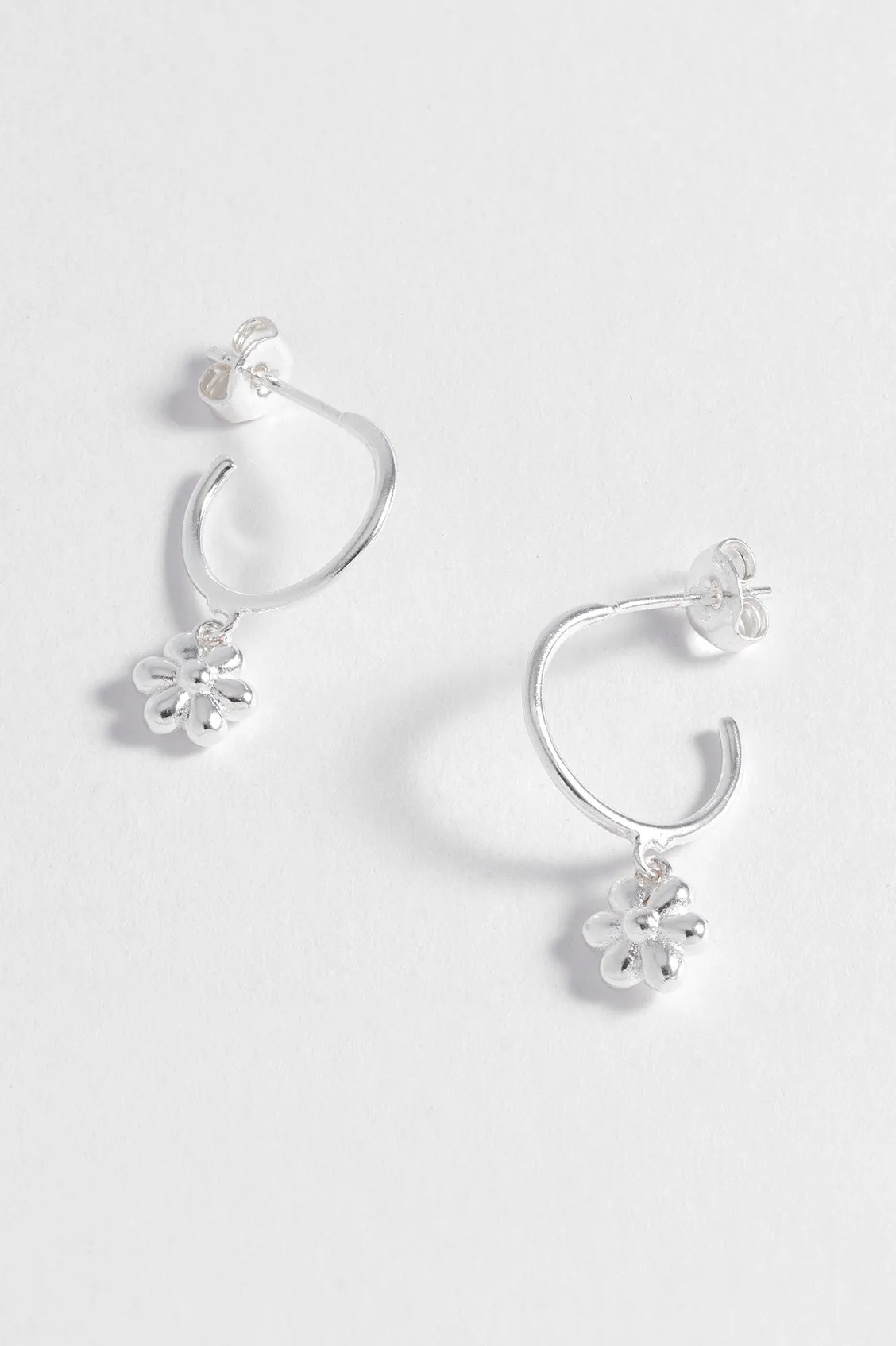 Flower Charm Drop Hoops sold by Estella Bartlett