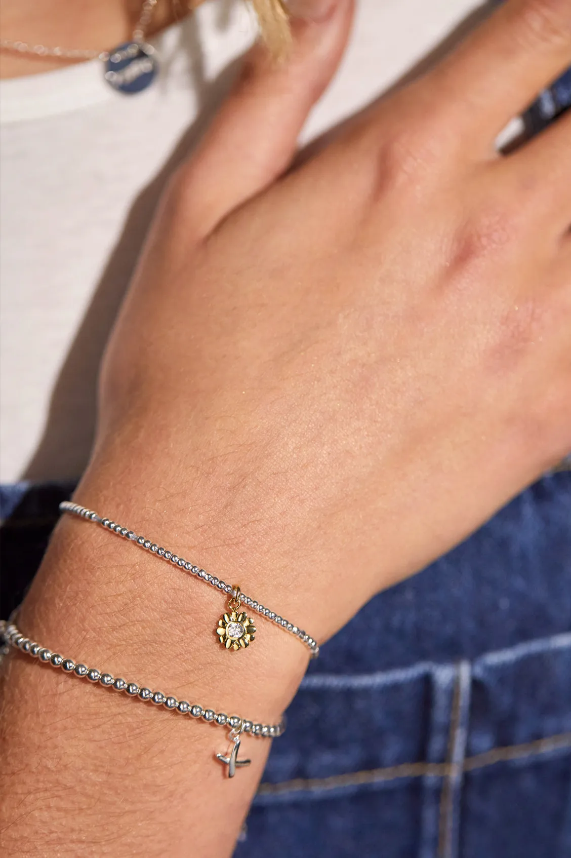 CZ Flower Charm Bracelet sold by Estella Bartlett product image thumbnail 4