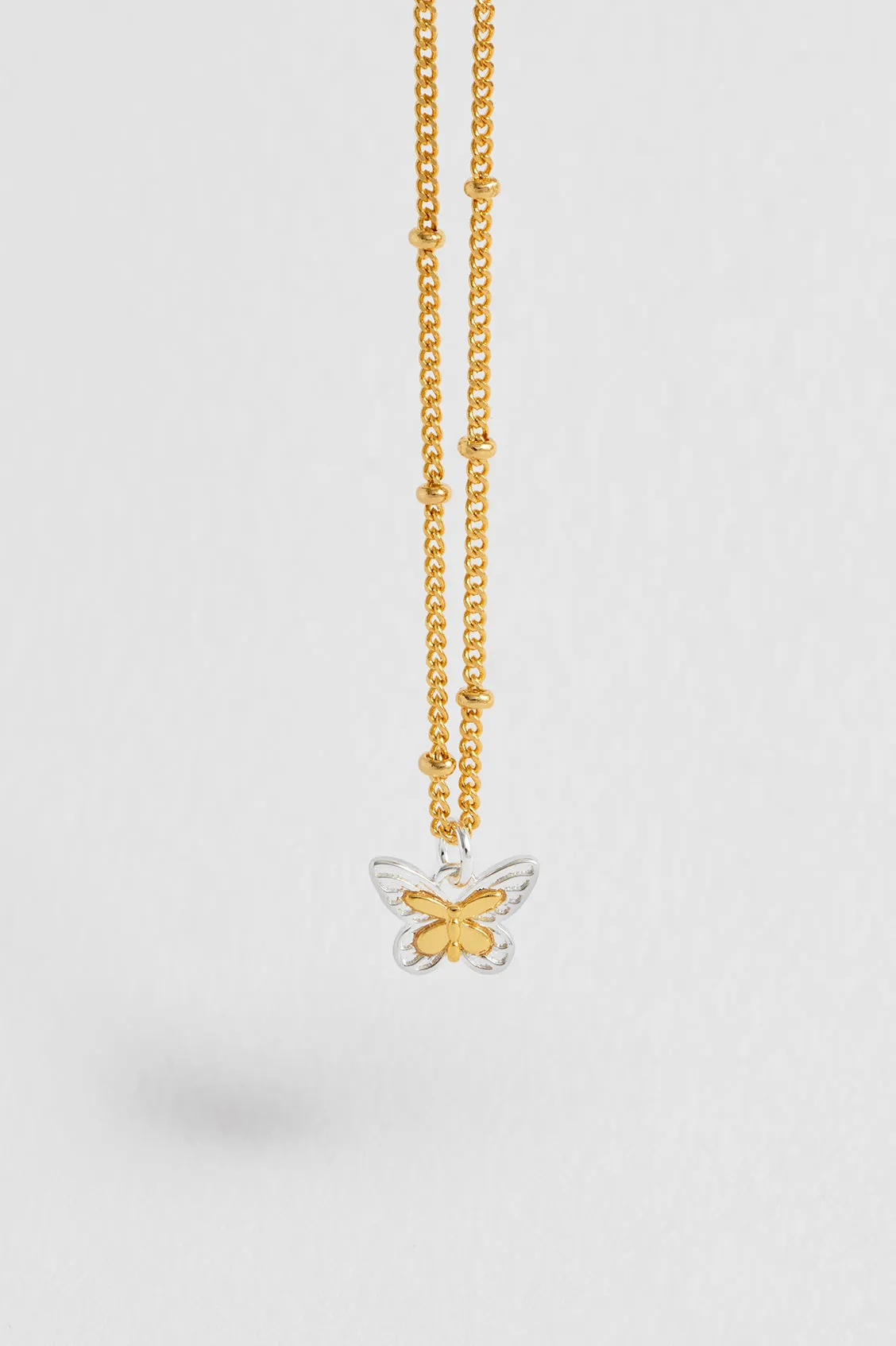 Mixed Metal Butterfly Necklace sold by Estella Bartlett product image thumbnail 4