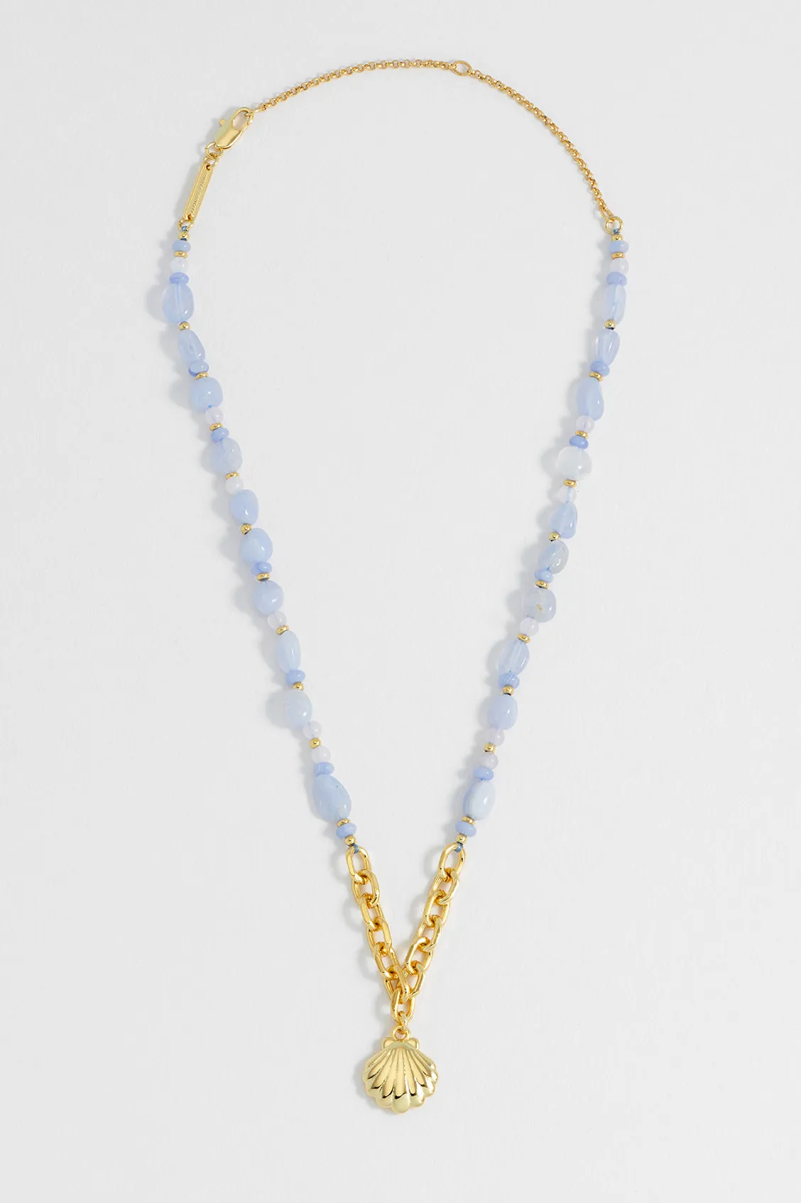 Blue Gemstone Seashell Charm Necklace sold by Estella Bartlett