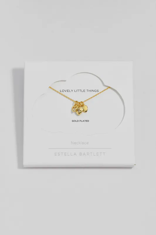 Triple Heart Charm Necklace made by Estella Bartlett