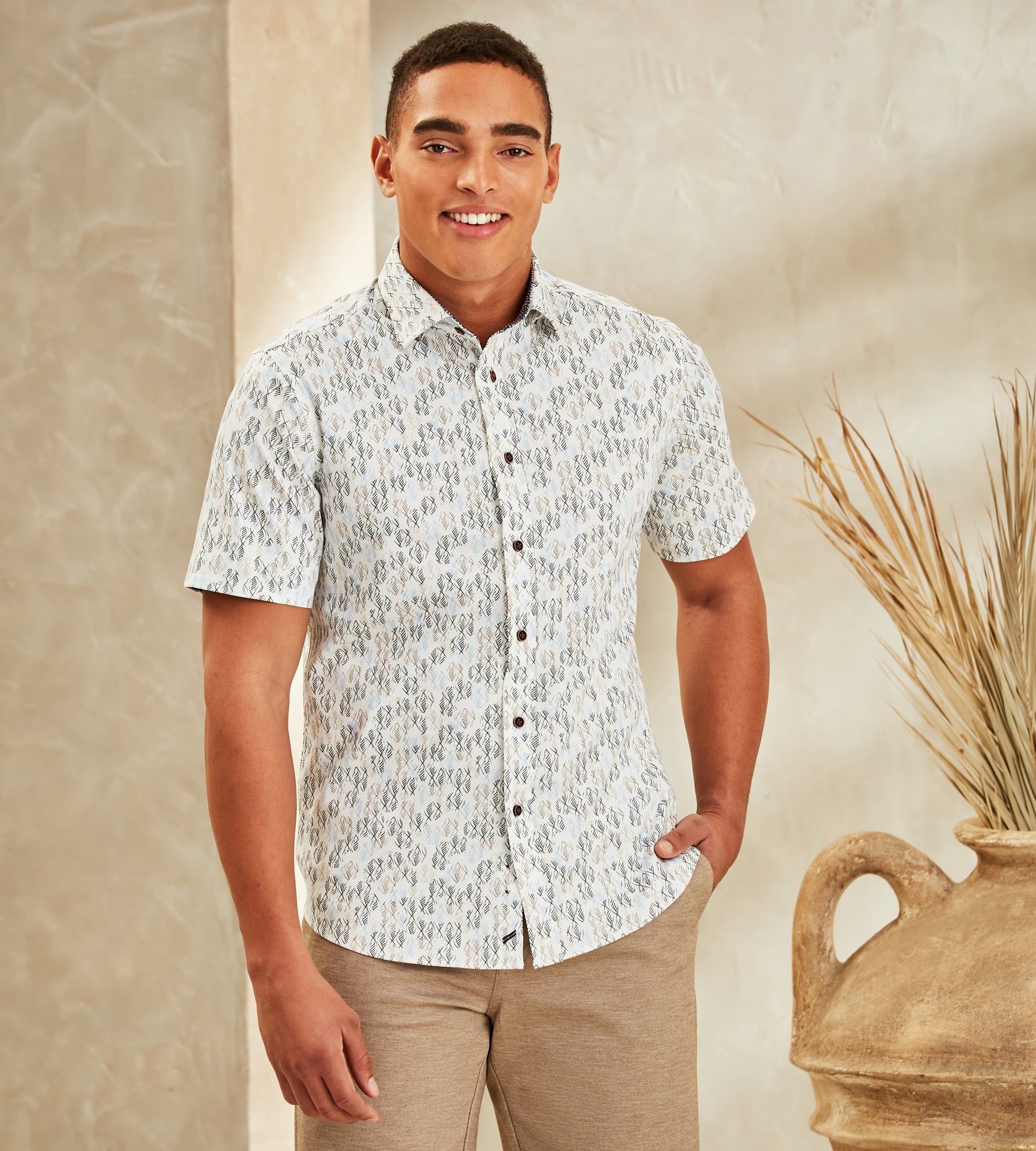 Modern Fit 360° Stretch Geo Fish Print Soft Touch Short-Sleeve Sport Shirt sold by Tip Top