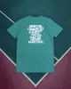 The Teal Mandate T sold by Buckets & Borders