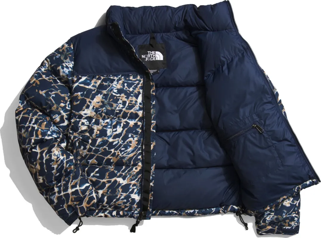 W 1996 Retro Nuptse Jacket Dusty Periwinkle Water Distortion Summit Navy sold by Quarks / Urban Trail
