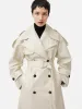 Nelson Patent Trench Coat | Cream sold by Jigsaw