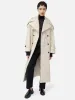 Nelson Patent Trench Coat | Cream sold by Jigsaw