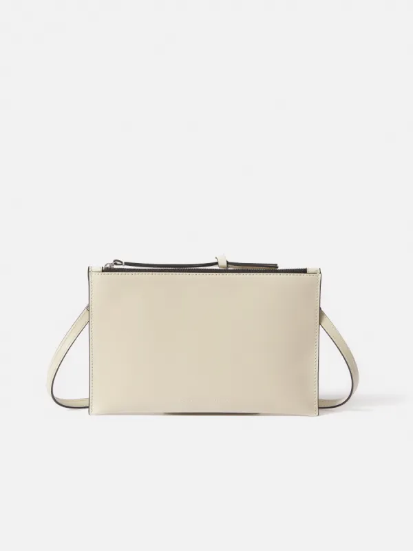 Ivy Cross Body Pouch | White sold by Jigsaw