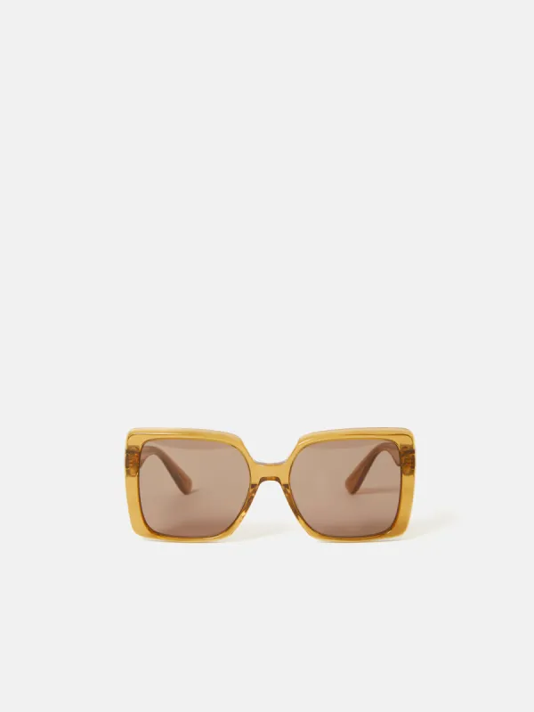 Calne Butterfly Frame Sunglasses | Amber sold by Jigsaw
