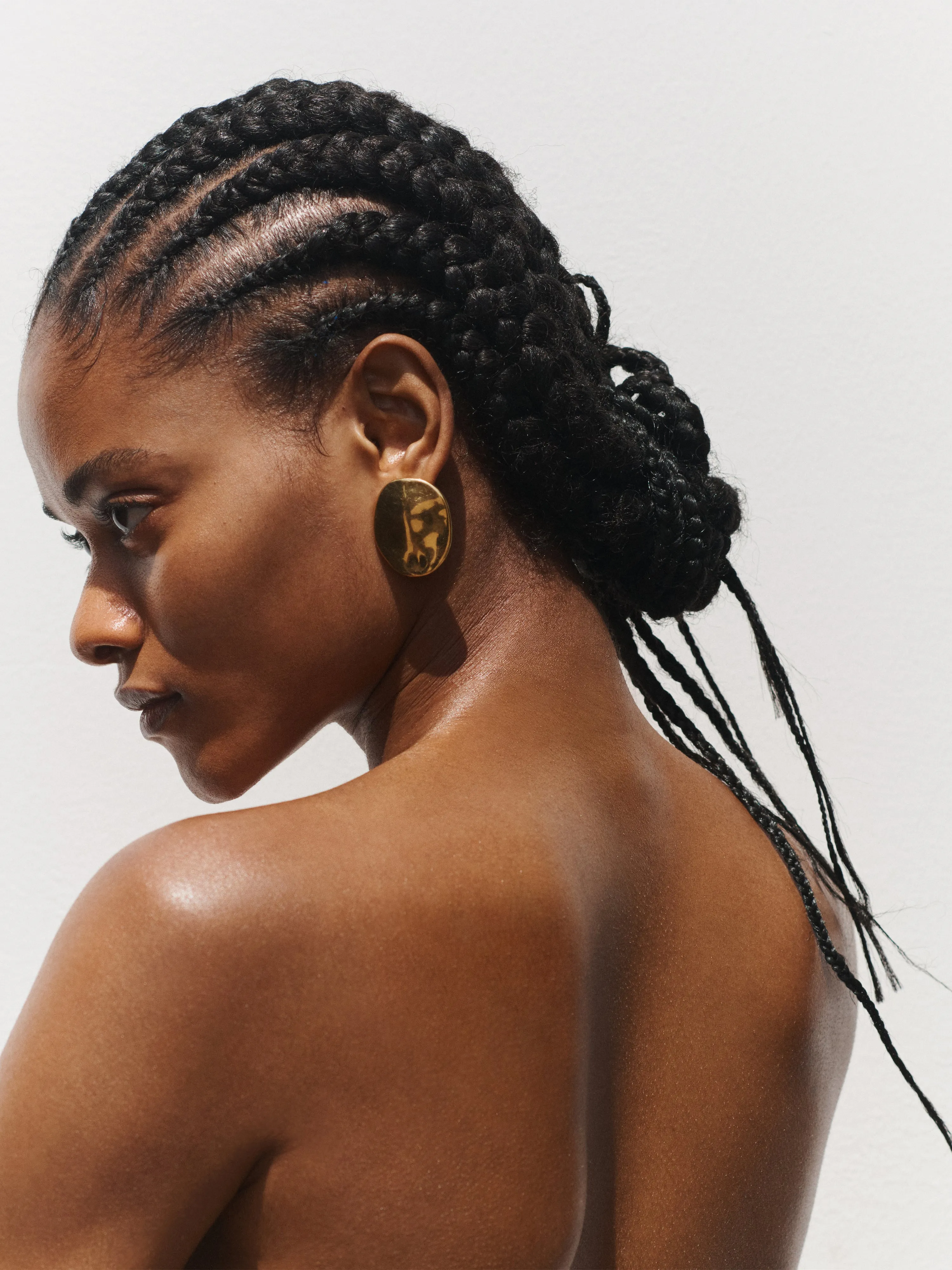 Hammered Disc Earrings | Gold sold by Jigsaw