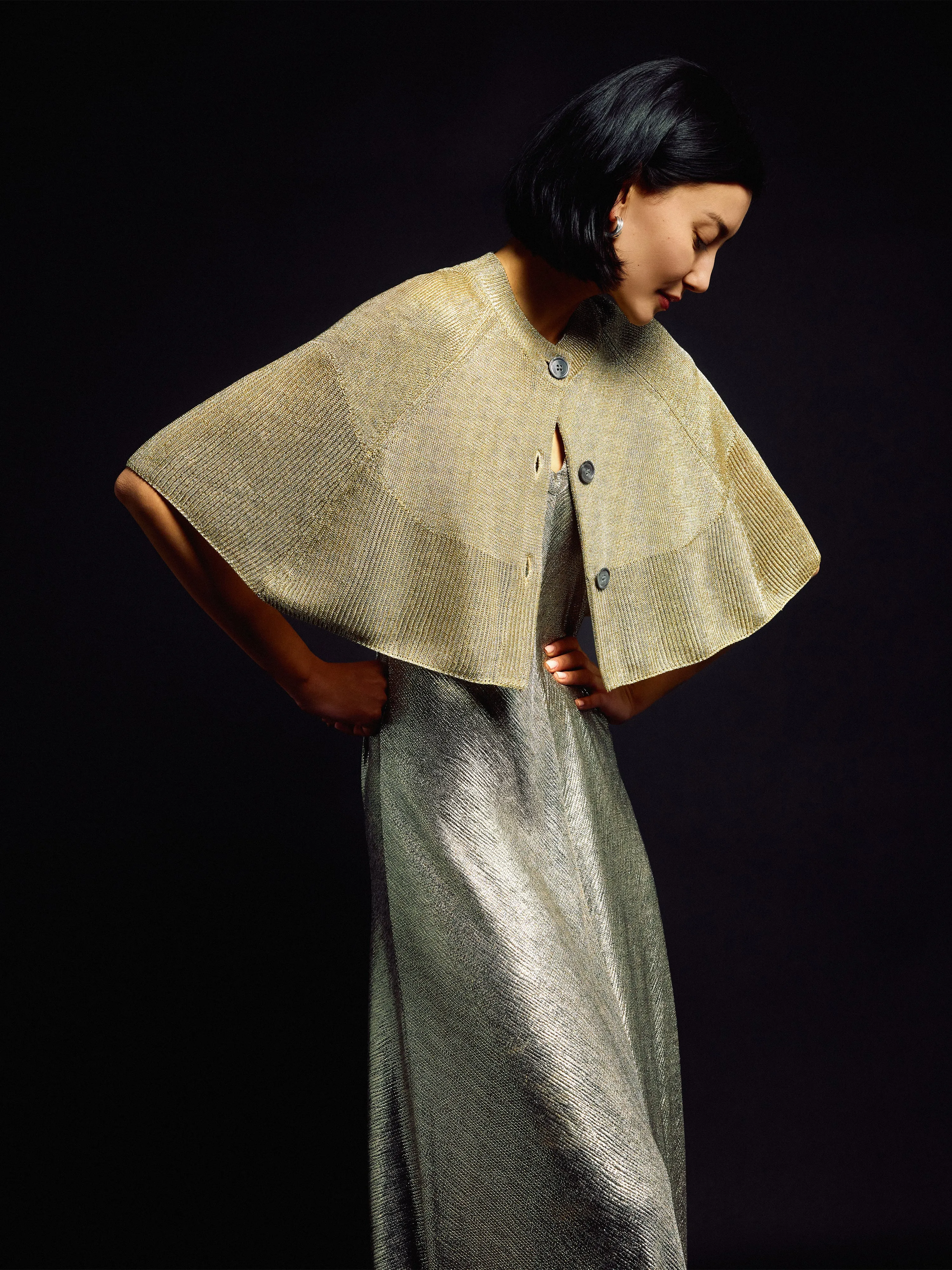 Sparkly Knitted Cape | Gold sold by Jigsaw