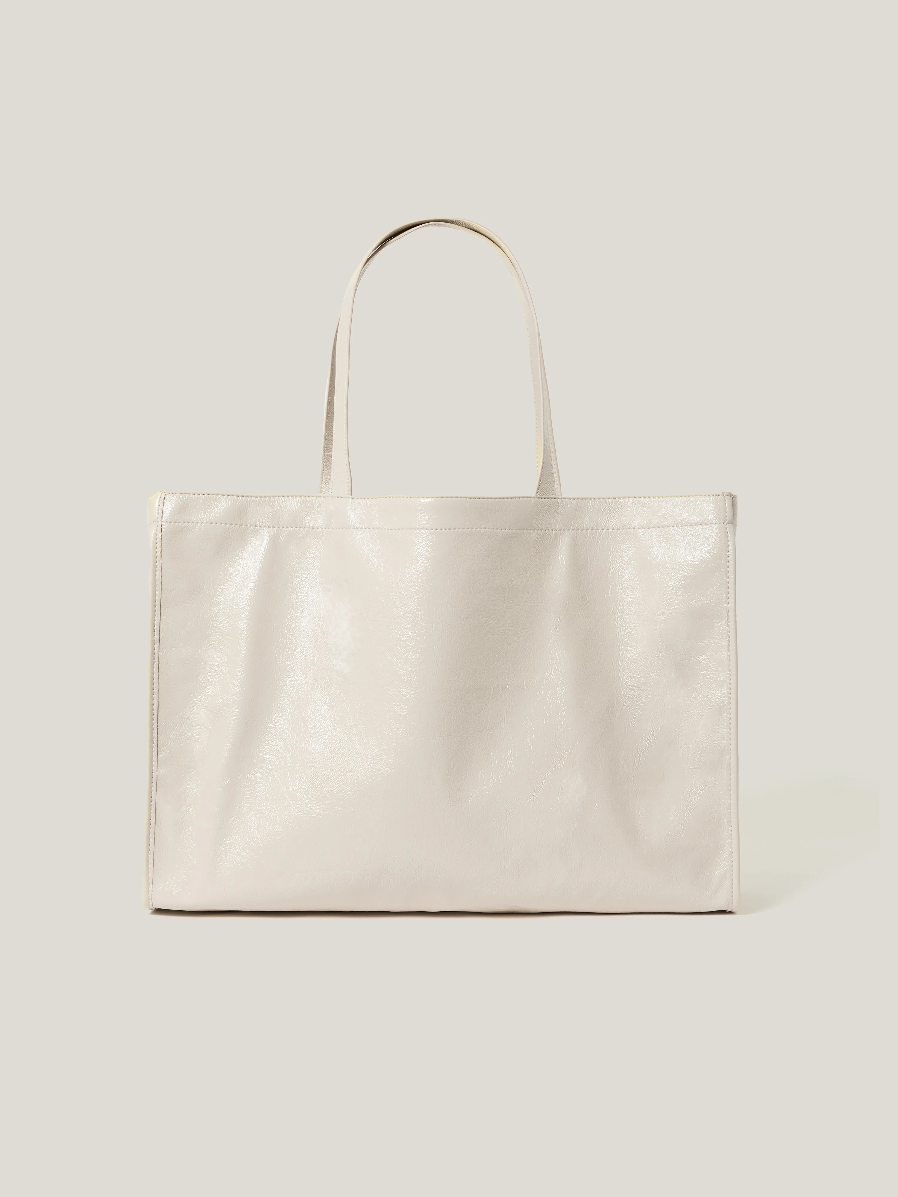 Large Patent Tote Bag | Cream sold by Jigsaw