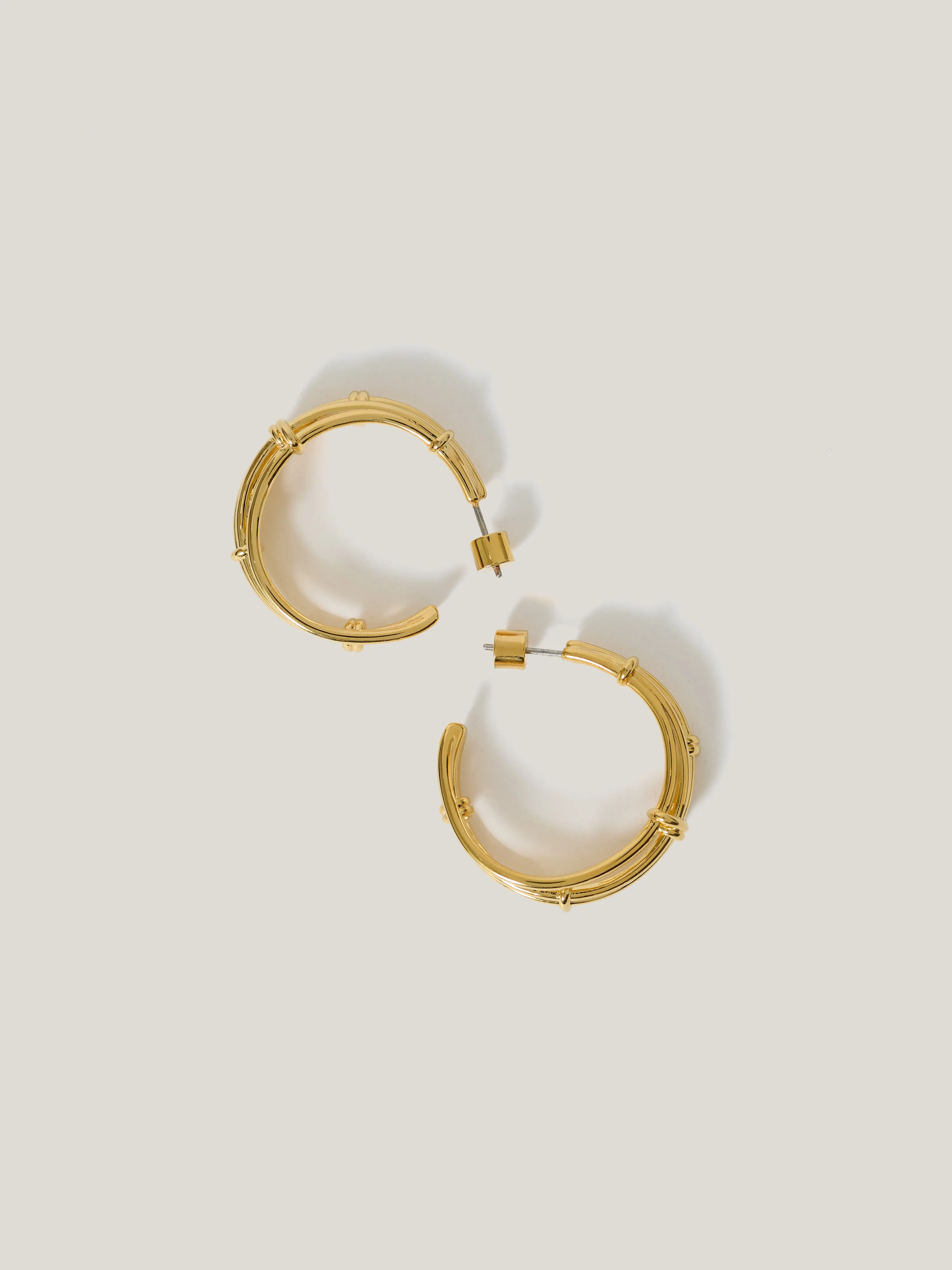 Dainty Loops Hoop Earring | Gold sold by Jigsaw