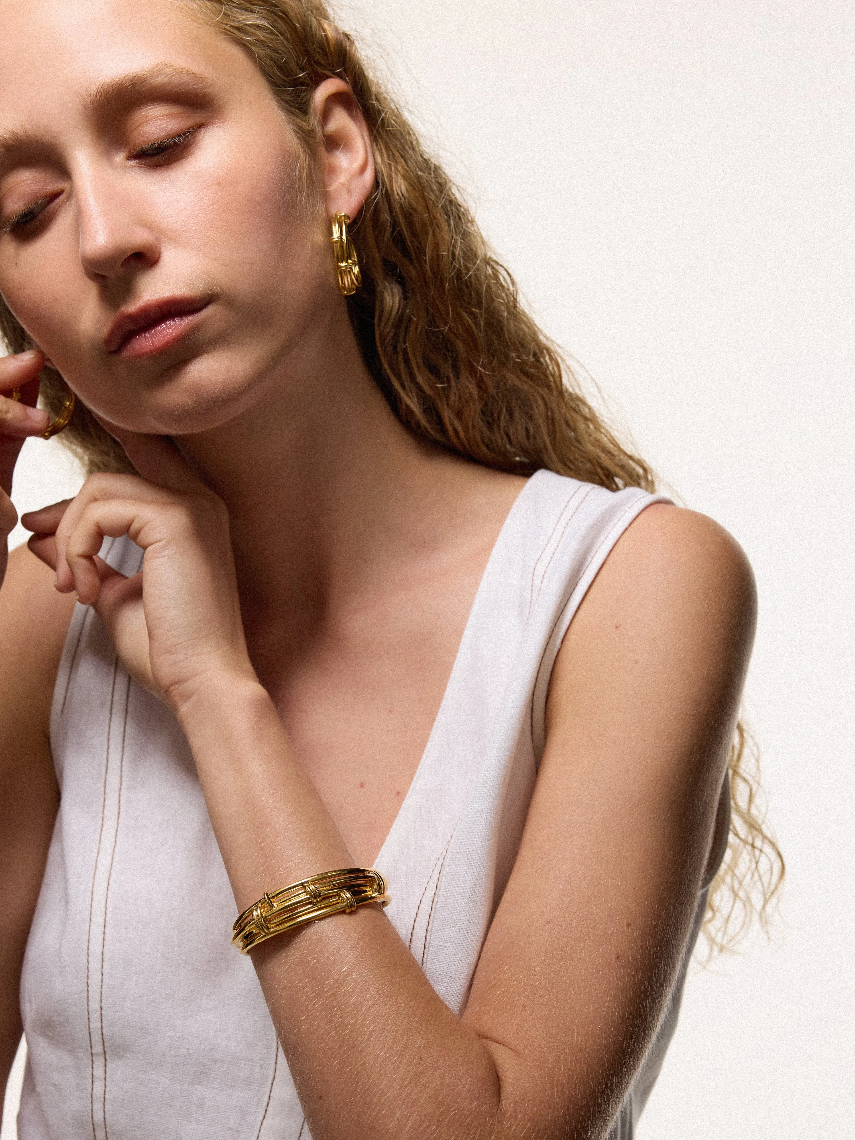 Dainty Loops Bangle Dainty Loops Bangle | Gold sold by Jigsaw