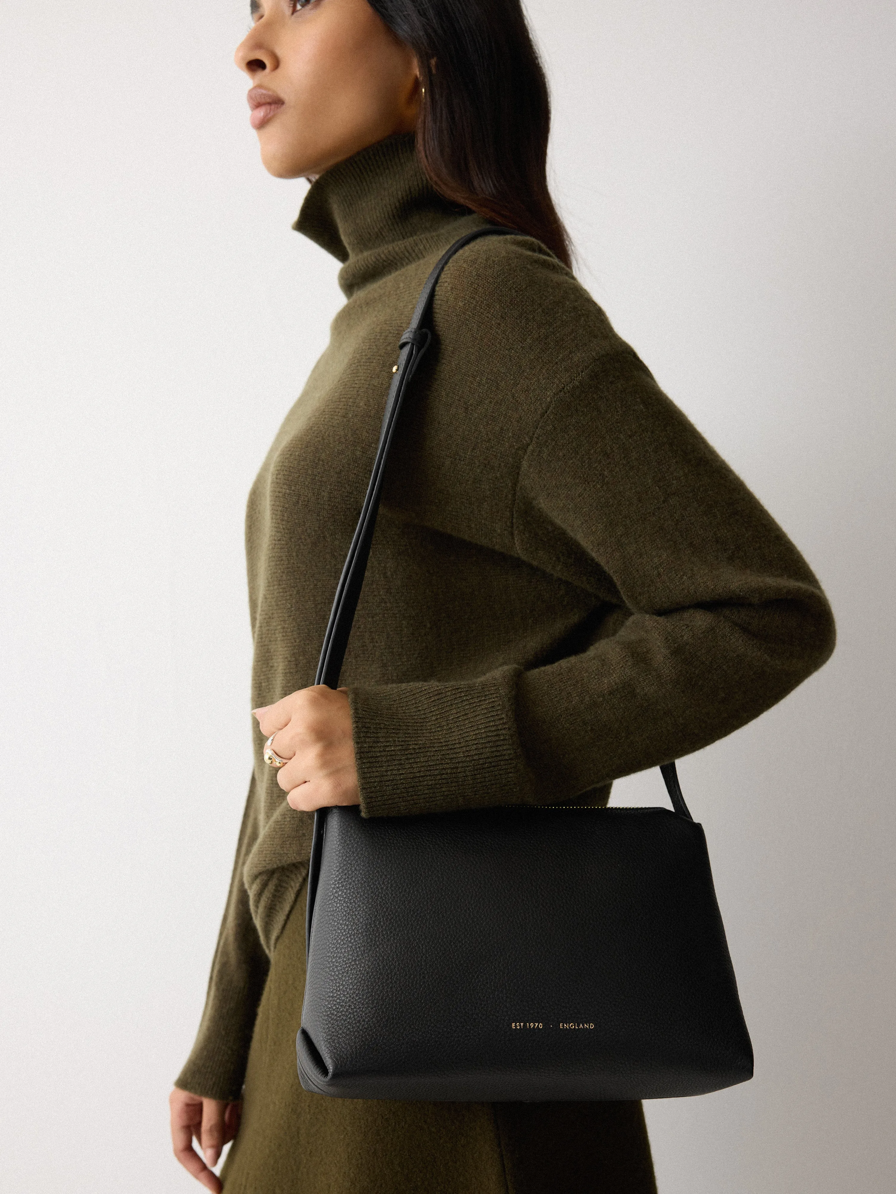 Bella Leather Cross Body Bag | Black sold by Jigsaw