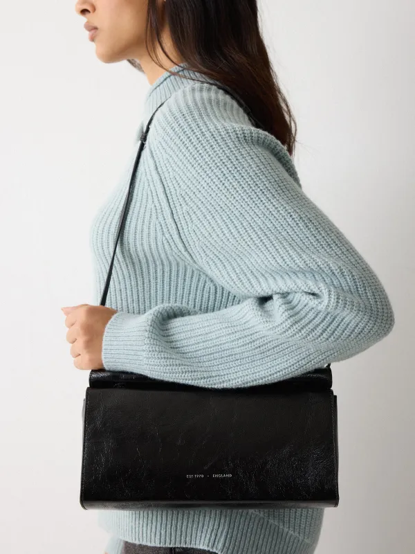 Fold Over Clutch Bag | Black sold by Jigsaw