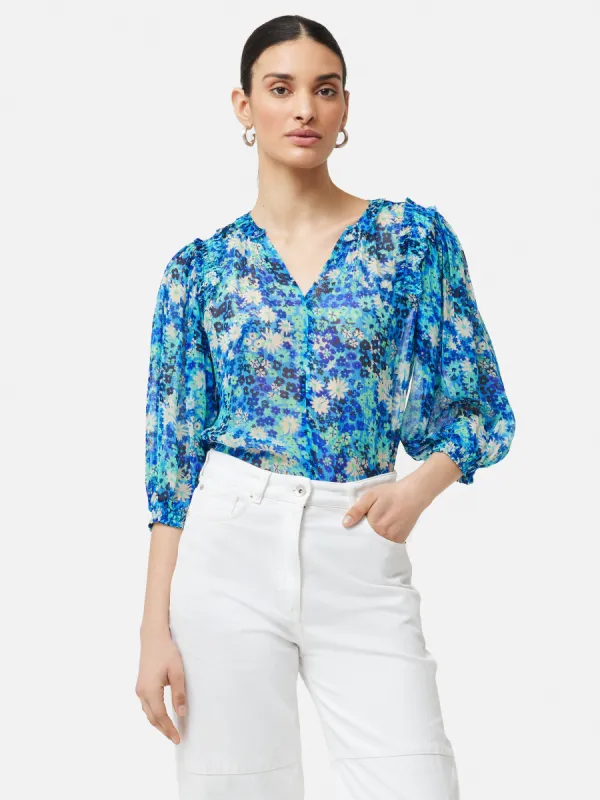 Rave Floral Crinkle Top | Blue sold by Jigsaw