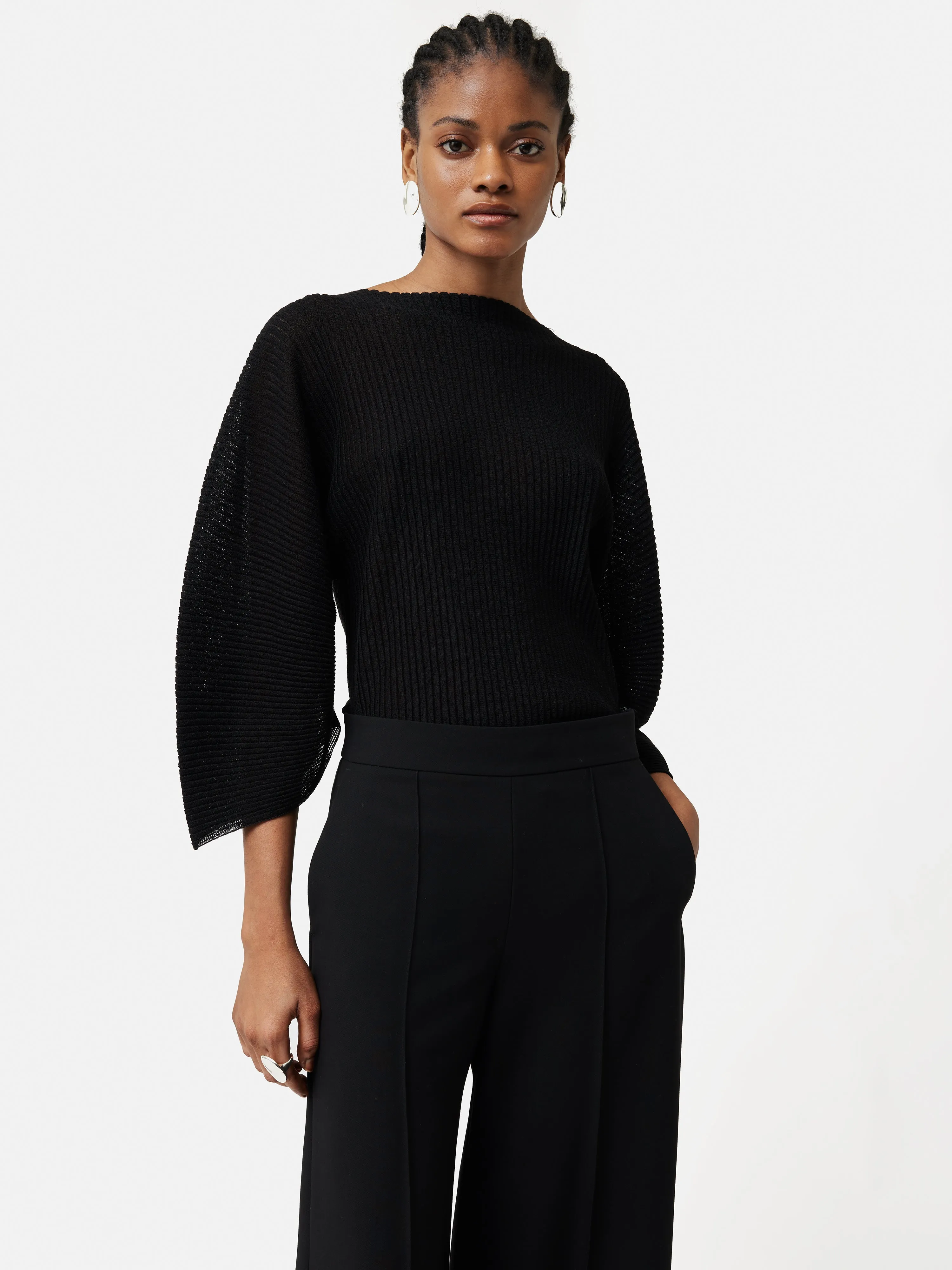 Circular Sleeve Knitted Top | Black sold by Jigsaw