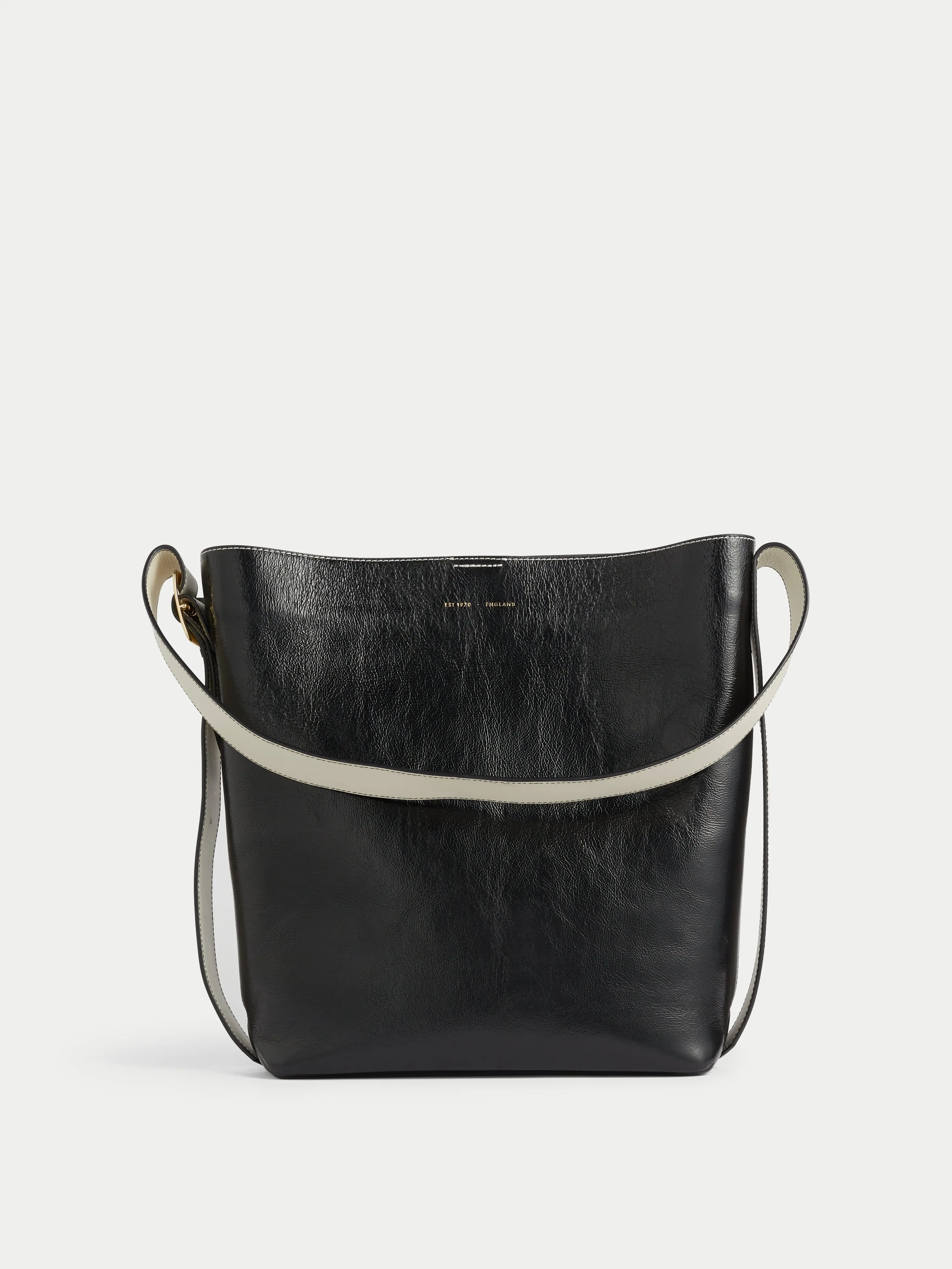 Zoey Buckle Patent Xl Tote | Black sold by Jigsaw
