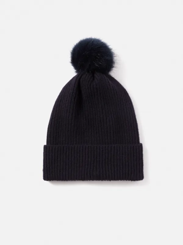 Faux Fur Pom Hat | Navy sold by Jigsaw