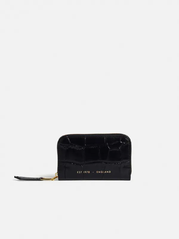 Maddie Croc Leather Purse | Black sold by Jigsaw